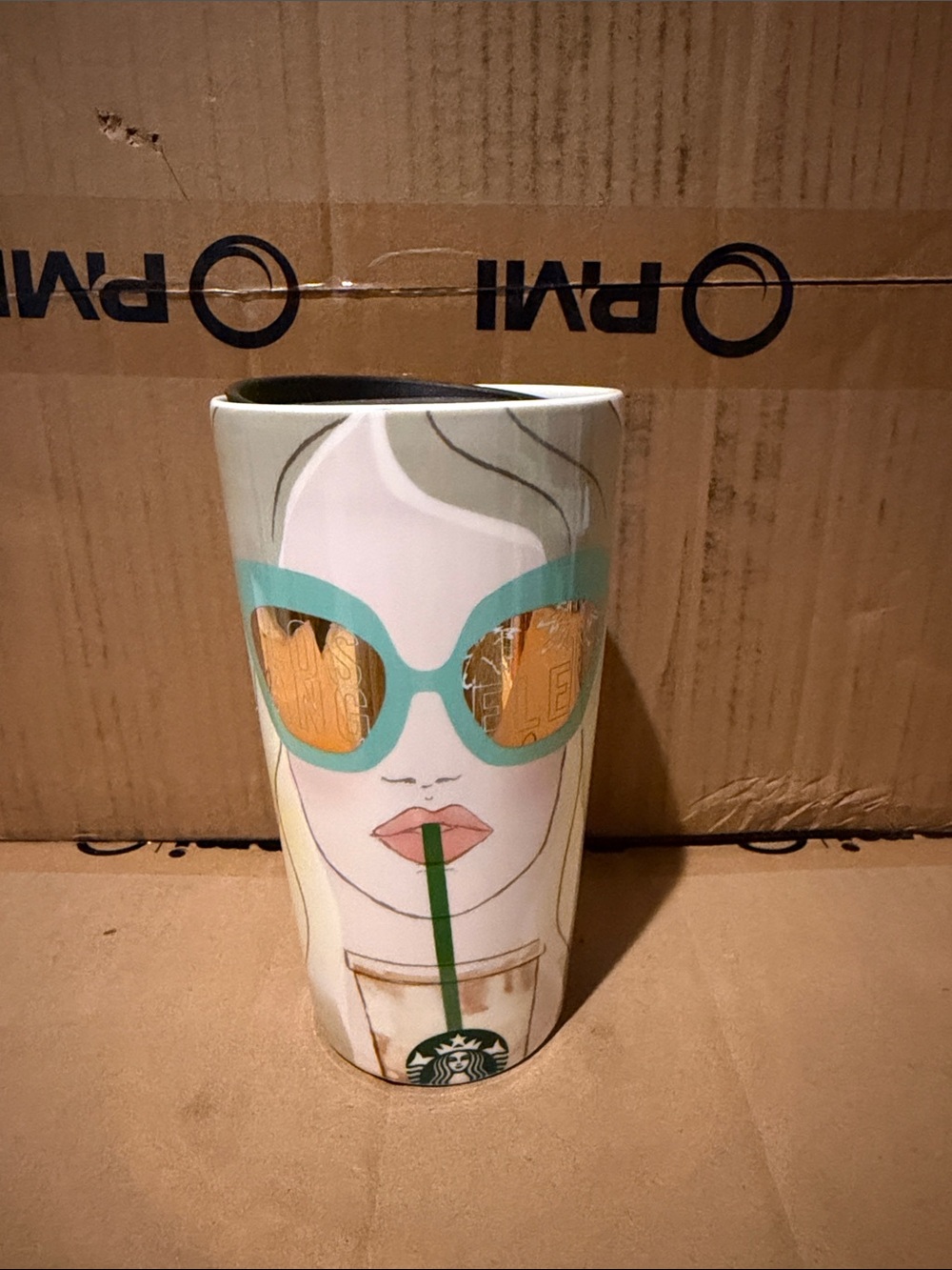 Starbucks White Ceramic Travel Mug with Teal Sunglasses and Gold Accents